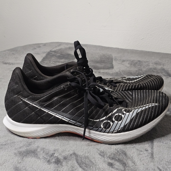 Saucony Black, White, and Pink Mens  Running Shoes With Spikes Size 9.5
